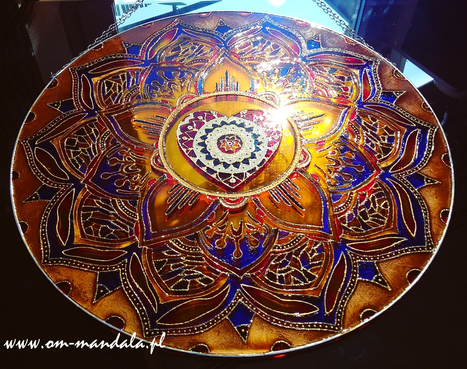 Mandala full of love energy on glass. To order visit: www.om-mandala.pl